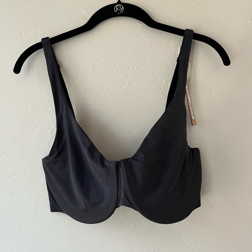 SKIMS SMOOTHING INTIMATES UNLINED MINIMIZER BRA IN ONYX 36D